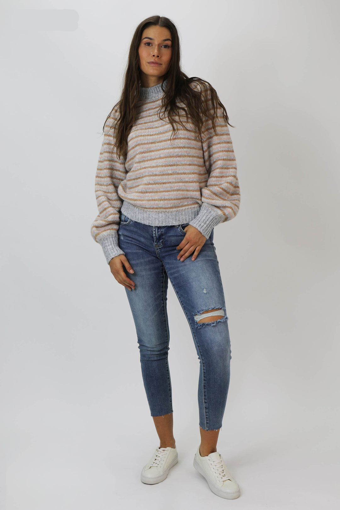 image of a female model wearing a JOYRICH MID RISE ANKLE SKINNY JEANS TUCSON JEANS