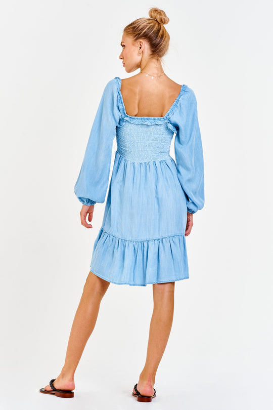 image of a female model wearing a ZENYA SMOCKED BODICE DRESS CAROLINA BLUE DEAR JOHN DENIM 