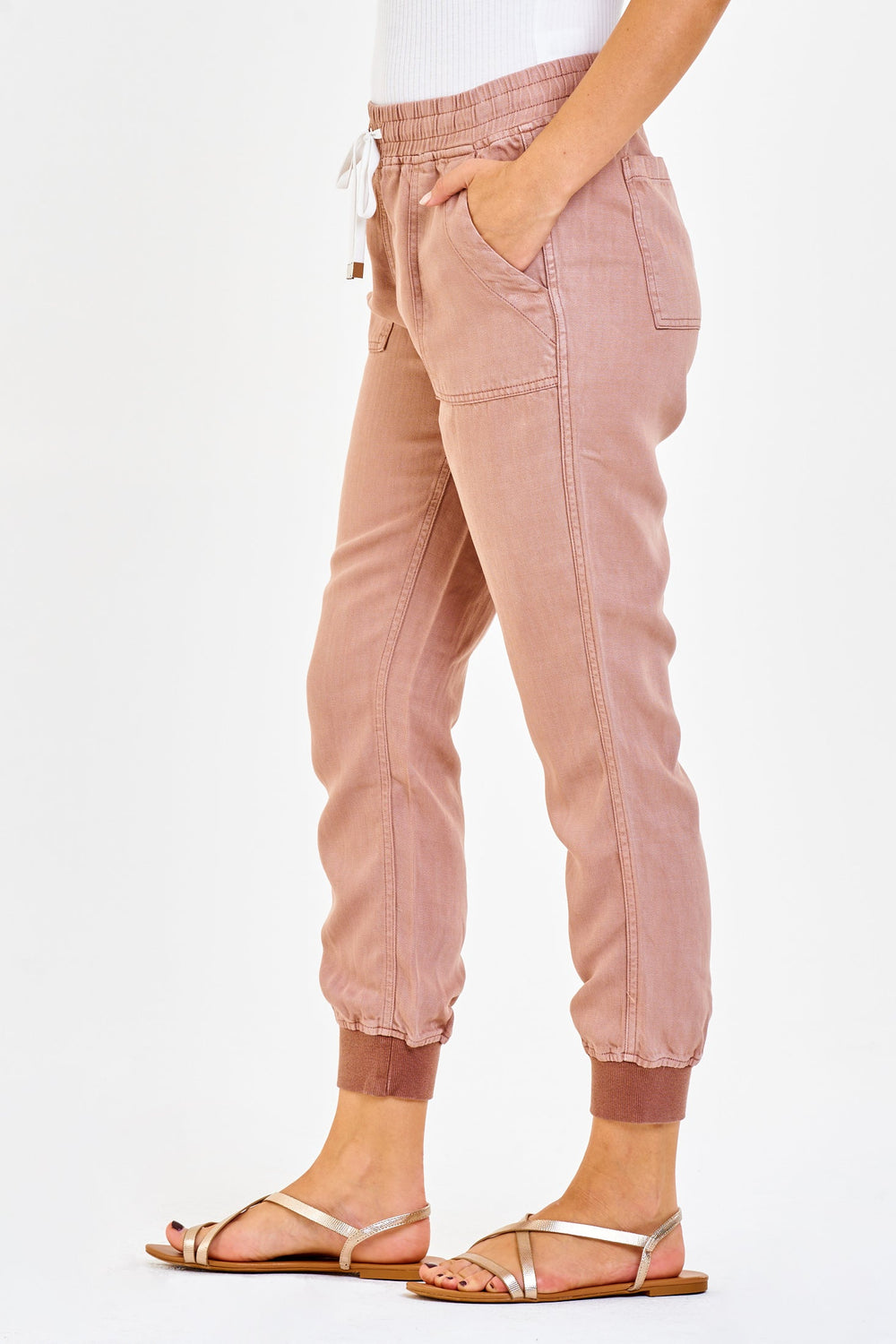 image of a female model wearing a JACEY SUPER HIGH RISE CROPPED JOGGER PANTS CLAY PANTS