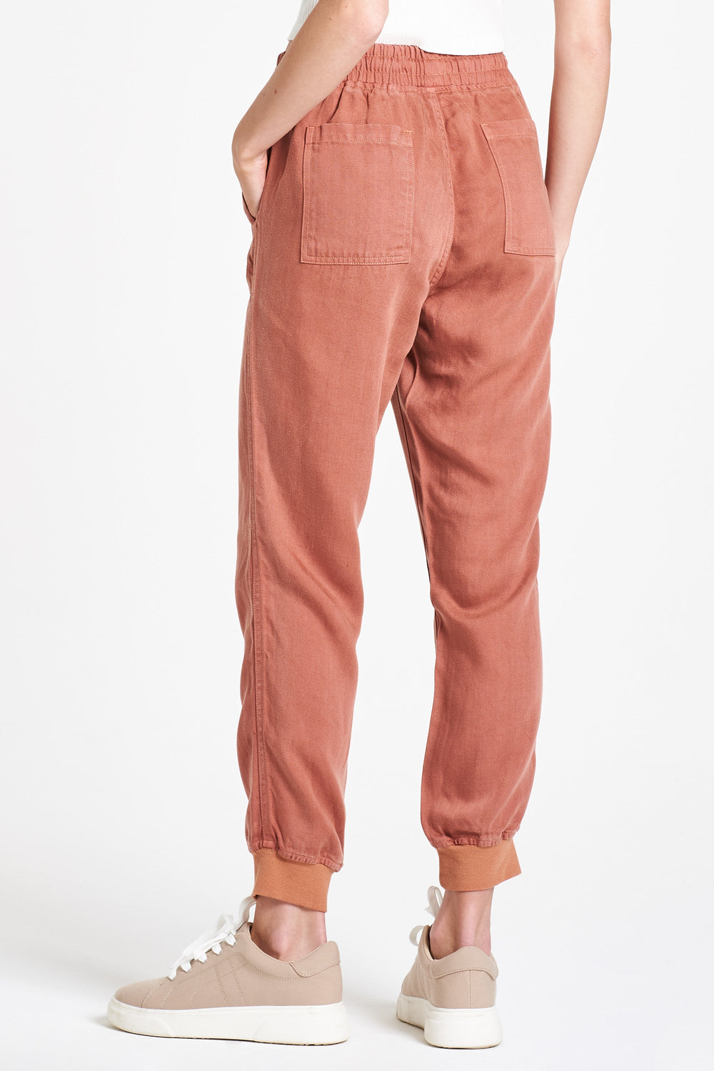 image of a female model wearing a JACEY SUPER HIGH RISE CROPPED JOGGER PANTS WISTFUL MAUVE PANTS