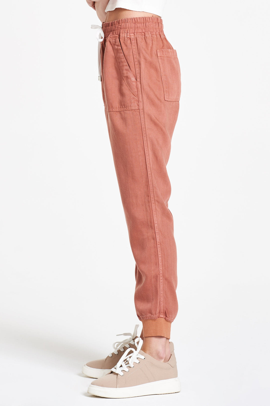 image of a female model wearing a JACEY SUPER HIGH RISE CROPPED JOGGER PANTS WISTFUL MAUVE PANTS