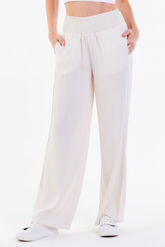 image of a female model wearing a LIZZIE LOUNGE PANTS OFF WHITE PANTS