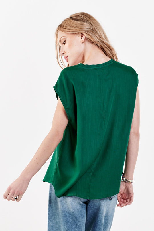 image of a female model wearing a YANIS SLEEVELESS TOP DARTMOUTH GREEN TOPS