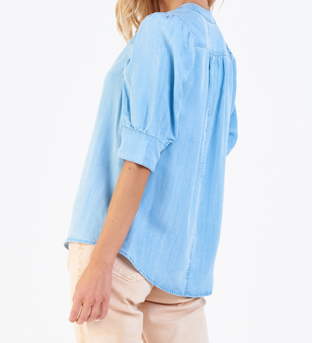 image of a female model wearing a ROWAN PUFF SLEEVE CAPRI SHIRT CAROLINA BLUE DEAR JOHN DENIM 