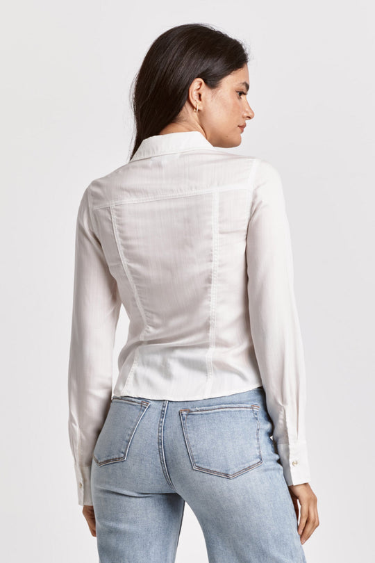 image of a female model wearing a URIAH PEARL SNAP SHIRT WHITE TENCEL DEAR JOHN DENIM 