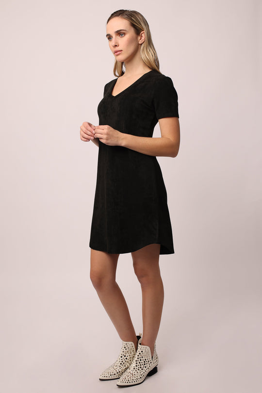 image of a female model wearing a ARIA V-NECK SIDE POCKET DRESS BLACK DRESSES