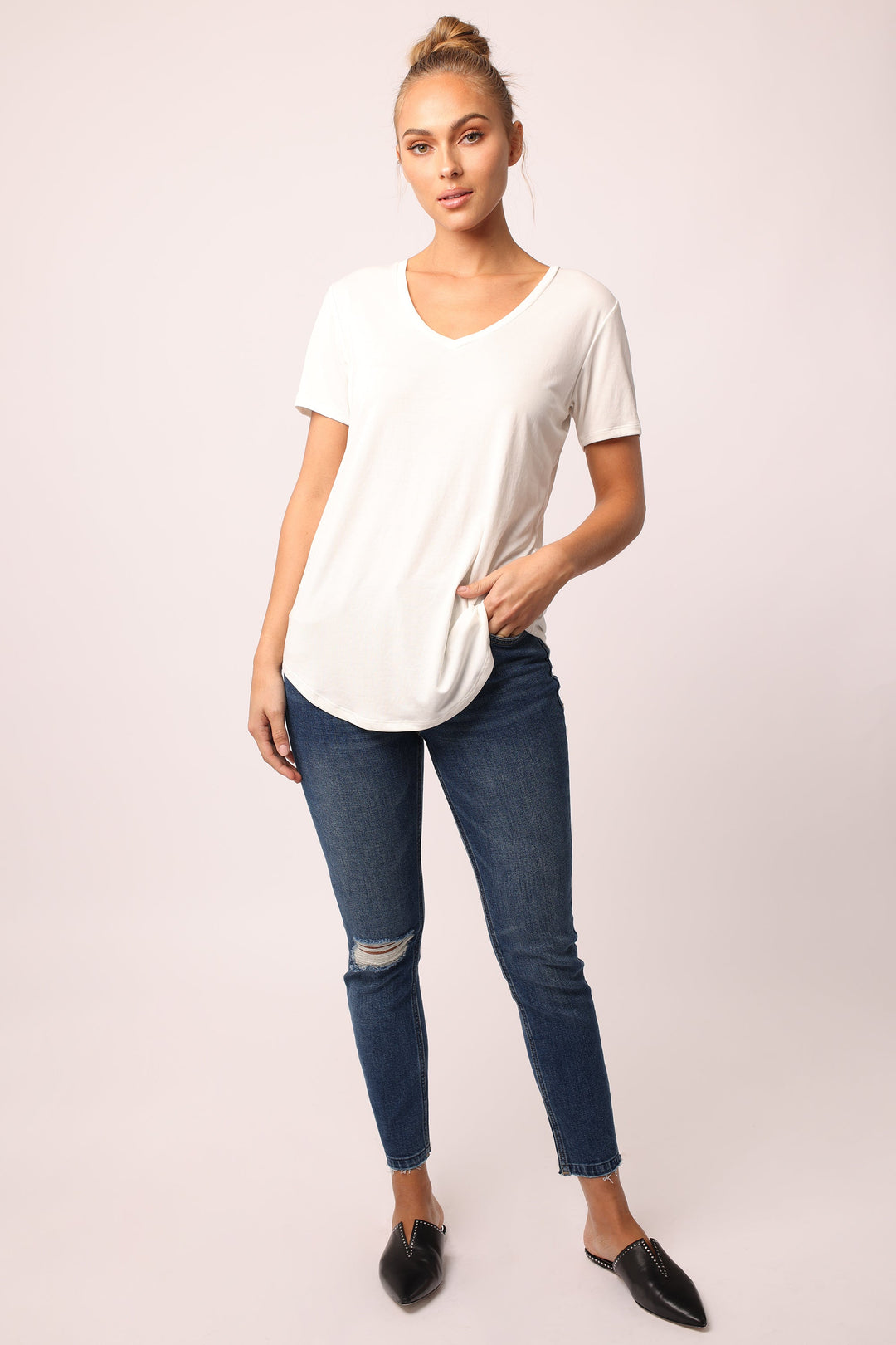 image of a female model wearing a MEGAN V-NECK TOP WHITE DEAR JOHN DENIM 