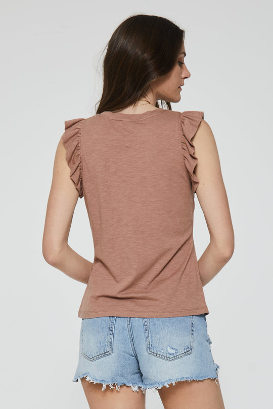 image of a female model wearing a NORTH RUFFLE TRIMMED TOP PINK CLAY TOPS