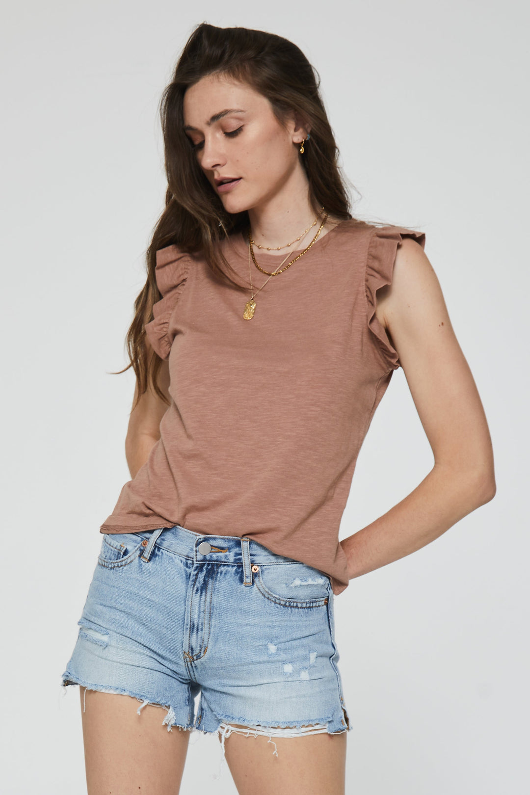 image of a female model wearing a NORTH RUFFLE TRIMMED TOP PINK CLAY DEAR JOHN DENIM 