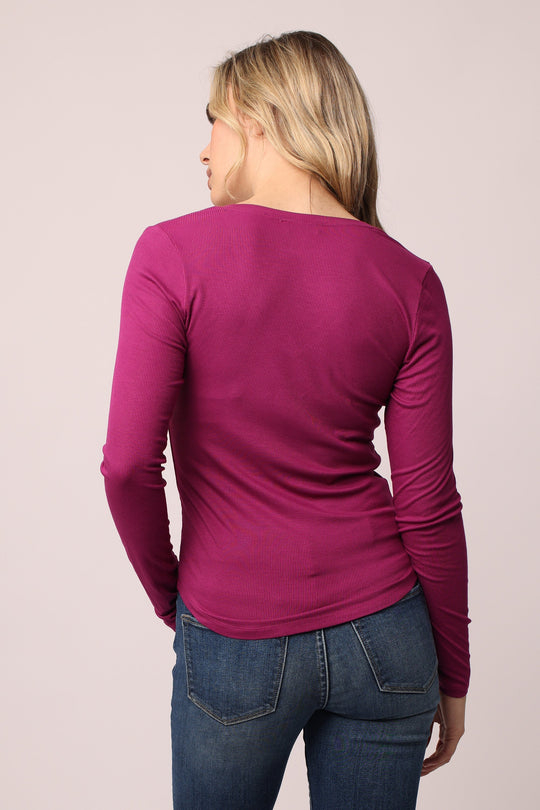 image of a female model wearing a SOPHIE LONG SLEEVE TEE FUCHSIA TOPS