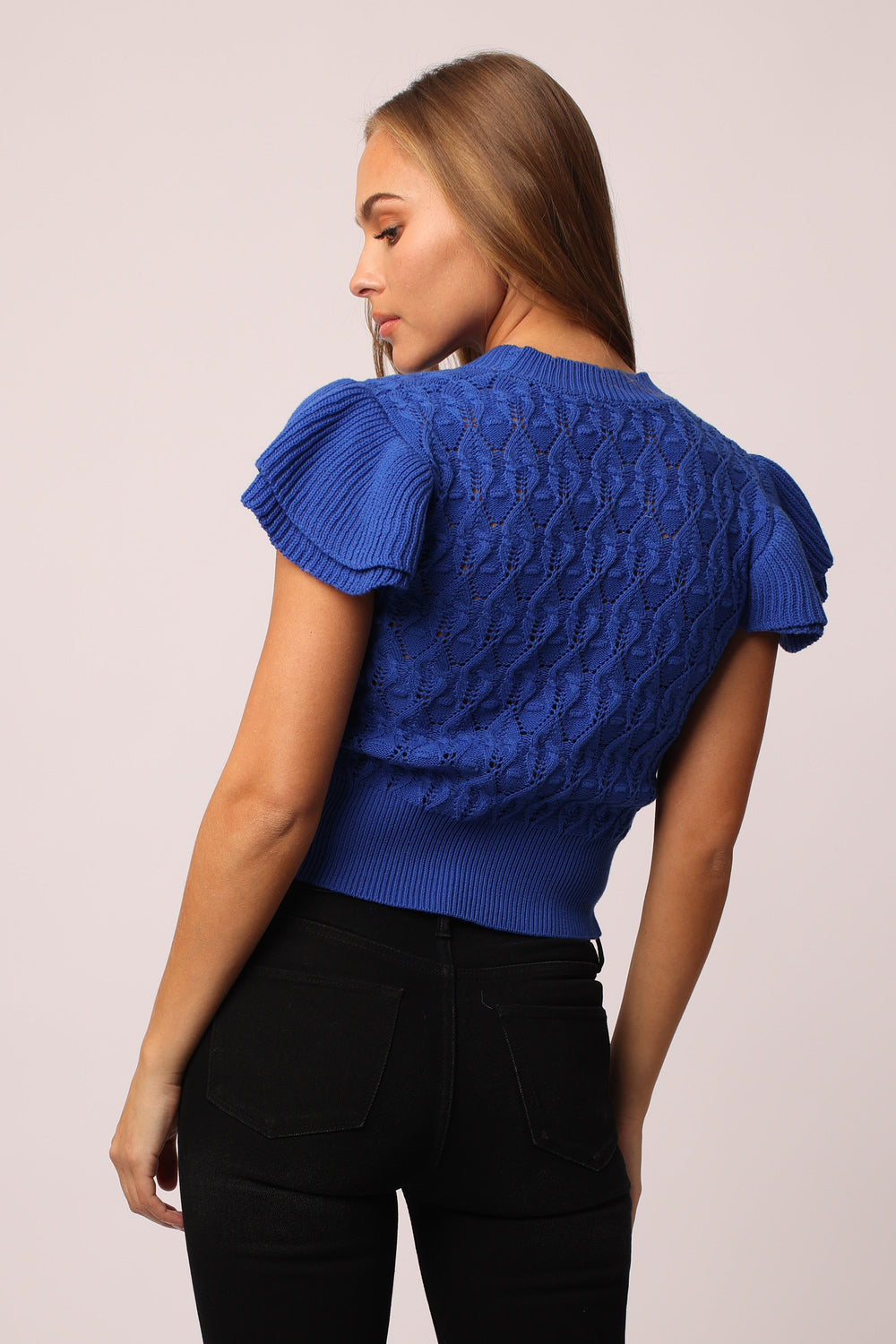 image of a female model wearing a MIRA SHORT SLEEVE SWEATER COBALT BLUE SWEATERS